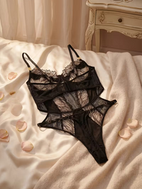 Body de encaje negro efecto animal print